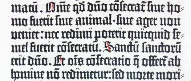 Page fron Gutenberg Bible with hung double hyphens