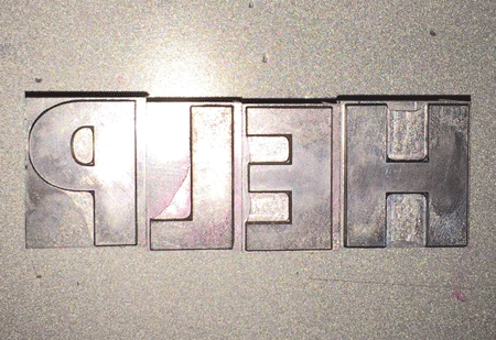 Figure 4: With metal type, the spacing is incorporated into each piece of metal.