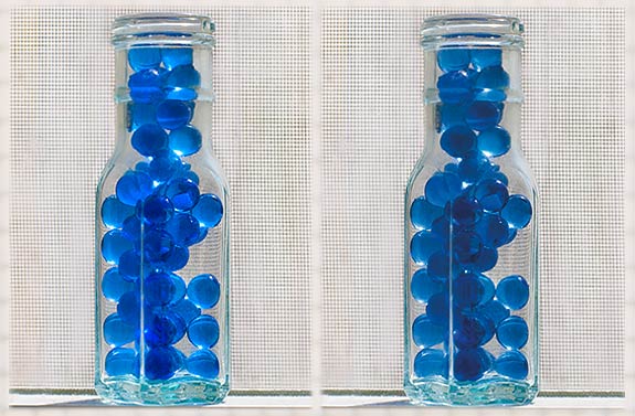Photo of blue glass beads in bottle to illustrate how soft-proofing works