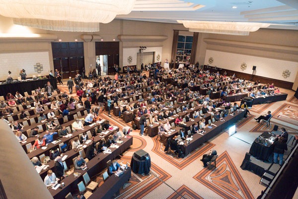 Over 400 attendees packed the conference rooms at the Sheraton Tysons Corner, while Marci Eversole (center) kept things running smoothly for everyone, including hosts Anne-Marie Concepción and David Blatner.