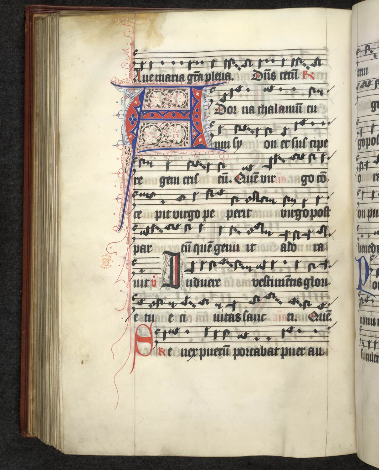 Musical notation with decorated red and blue capital H