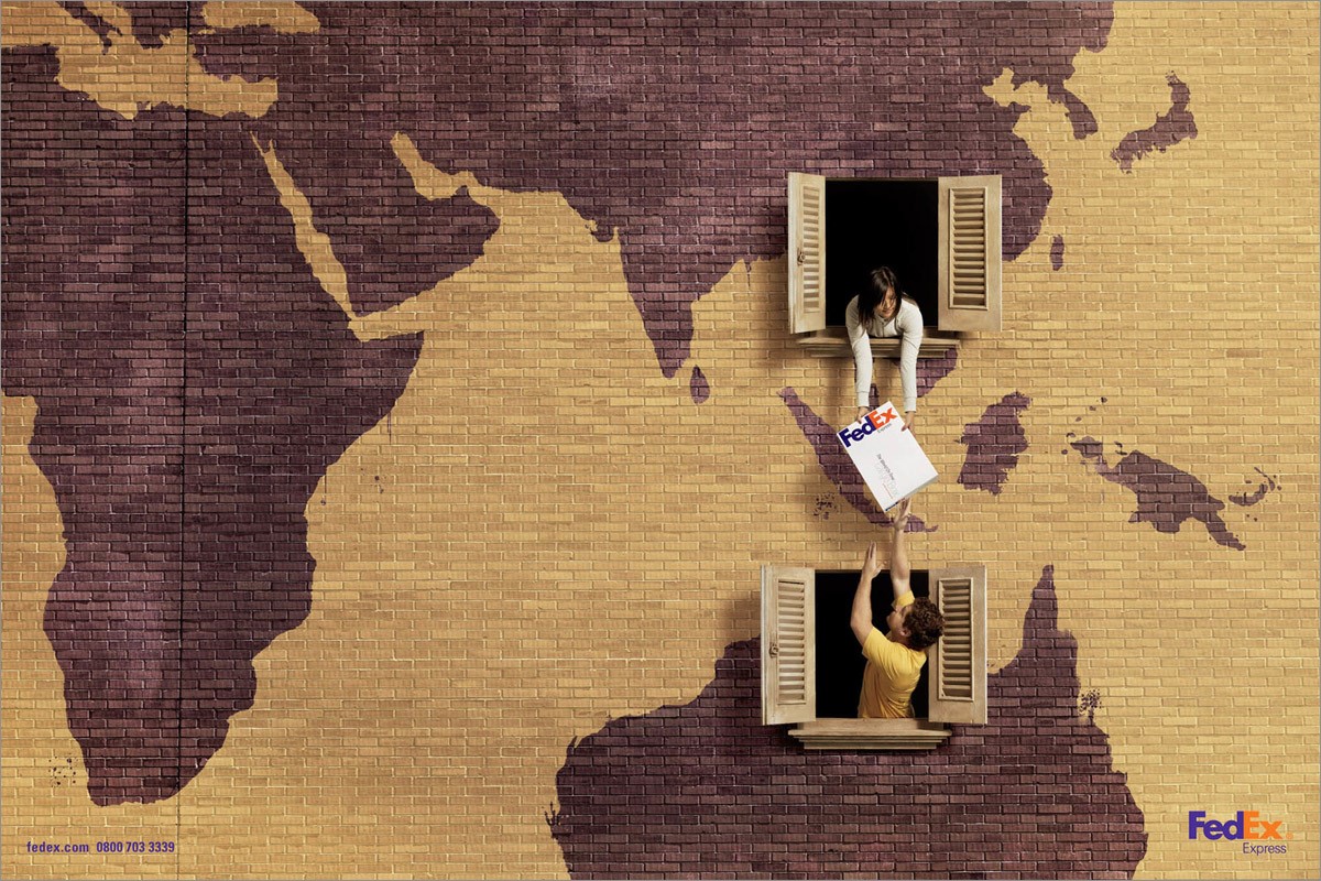 FedEx ad showing people passing a package through windows
