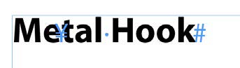 Text "Metal Hook" set with invisible characters on, showing anchored text in the middle of word "Metal"