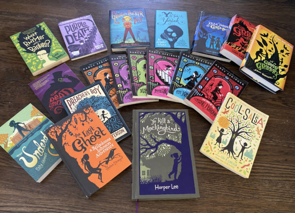 Display of 19 books on a table