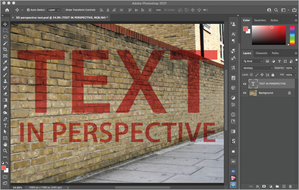 Photo of brick wall taken from angle, with native Photoshop text "TEXT IN PERSPECTIVE" superimposed as text layer "TEXT IN PERSPECTIVE" on background layer.