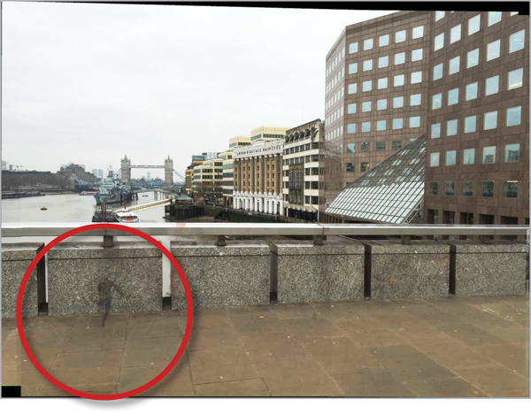 Composite image without people shows digital artifact remaining, highlighted in red-rule circle.