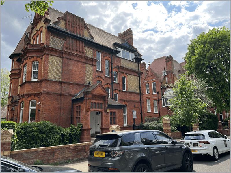 Figure 24. The line of cars spoils our view of this building.