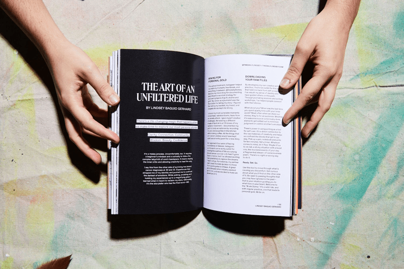 Figure 3. A product photo for the third edition of the zine, Raw, highlights the tactile presence of a physical zine. 