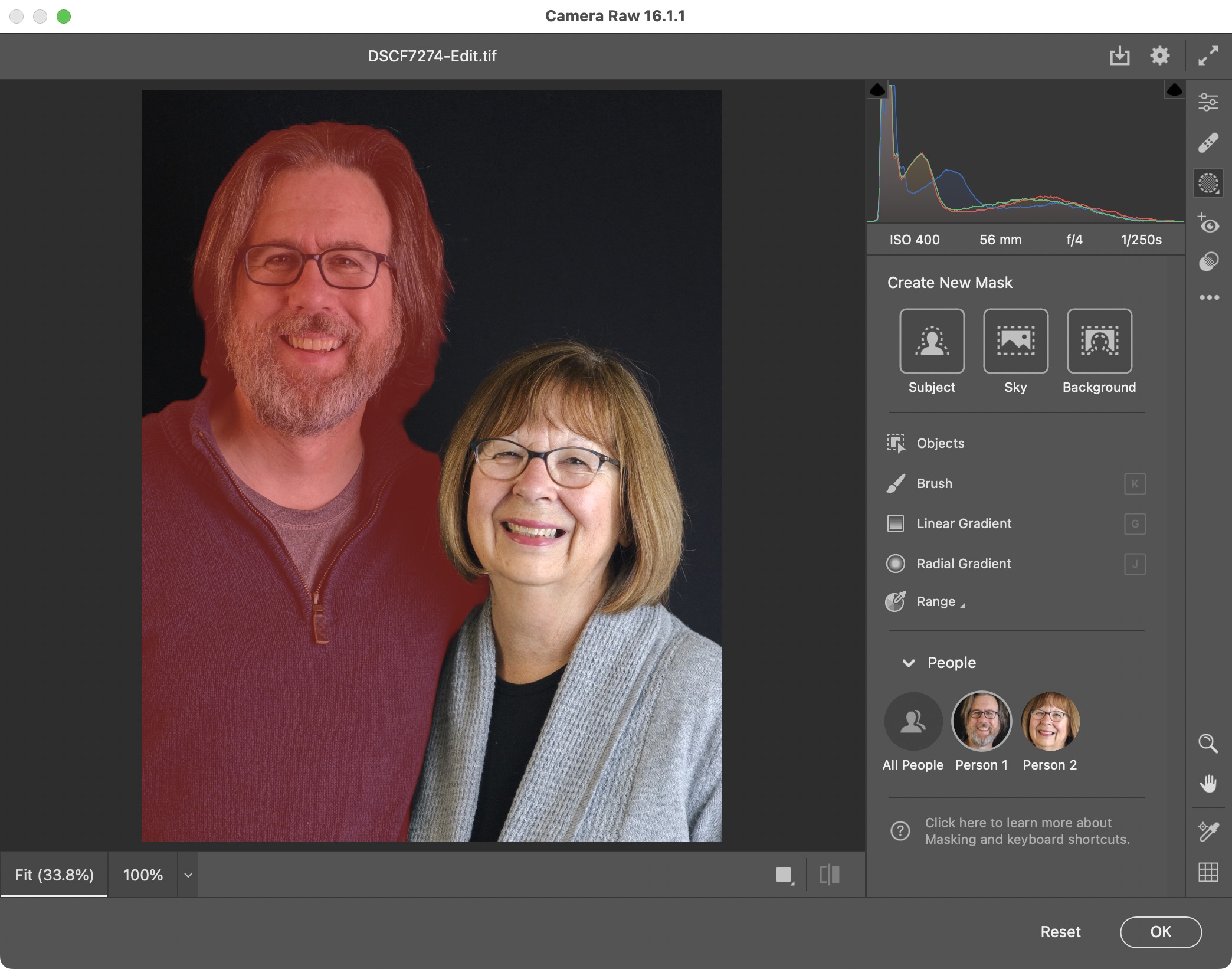 Screenshot of Adobe Camera Raw with a portrait containing two people, one of whom is selected in red.