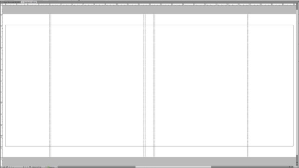 Screen shot shows guides off and dashed rules defining the folds of a dust jacket's elements, like turn and flaps.