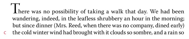 Four lines of text with initial cap sized so ascender of first letter is approximately one line space taller than the ascenders of the first line of text.
